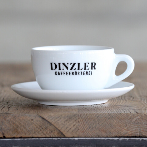 Milchkaffeetasse mit Dinzler Logo, und Unterteller